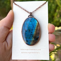 Copper labradorite dragon mountains pendant