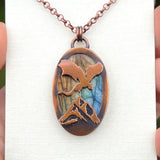 Copper labradorite dragon mountains pendant