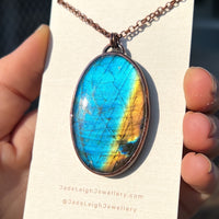 Copper labradorite dragon mountains pendant