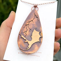 Copper labradorite dragon lightning pendant