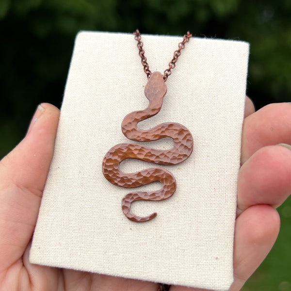 Snake pendant, hammered copper